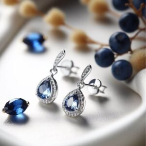 white gold earrings with natural blue Sapphire stones made by Sarah Netanya