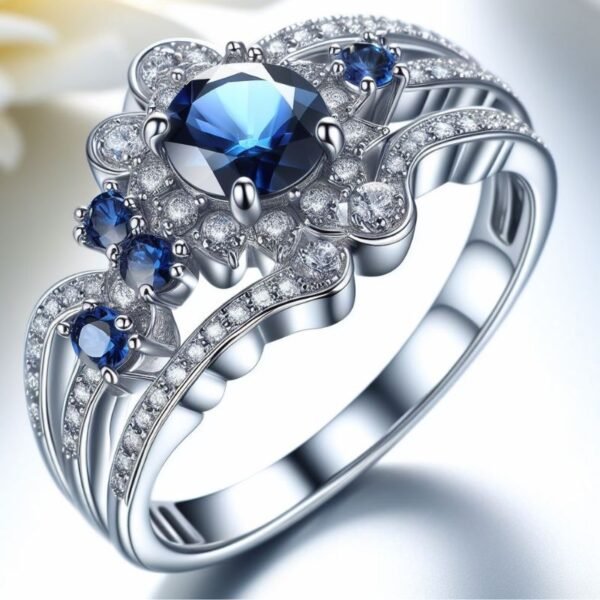 white gold designer ring with natural blue sapphire stones designed by Sarah Netanya