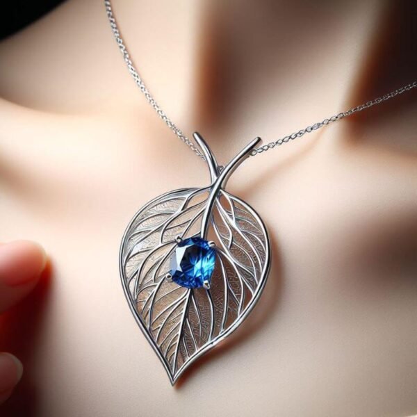 leaf shape pendent and white gold necklace designed by Sarah Netanya